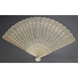 A Late 19th Early 20th Century Chinese Bone Brise Fan, finely pierced with three cartouche, 26.