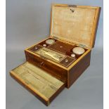 A Regency Rosewood Brass Inlaid and Boxwood Lined Dressing Case,