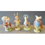 A Beswick Beatrix Potter 'Timmy Tiptoes' together with three other similar figures Jemima