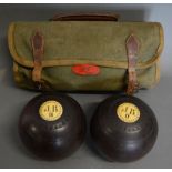 A Pair of Lignum Vitae Bowls with Ivory Inlays