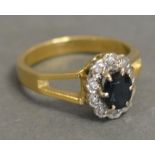 An 18ct. Yellow Gold Diamond and Sapphir