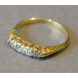 An 18ct. Yellow Gold Diamond Ring set wi