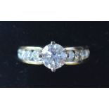 An 18ct. Yellow Gold Solitaire Diamond R