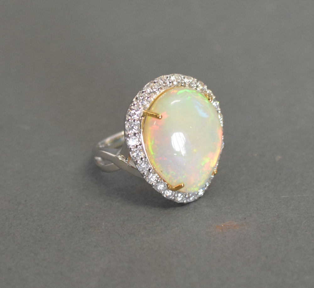 An 18ct White Gold Opal and Diamond Clus