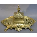 A Victorian Brass Inkstand with a pierce