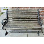 A Wrought Iron and Wooden Garden Bench o