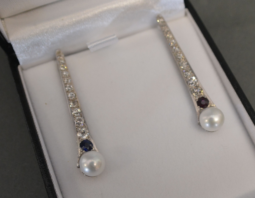 A Pair of White Gold Diamond and Pearl D