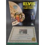 An Elvis Presley LP with original signat