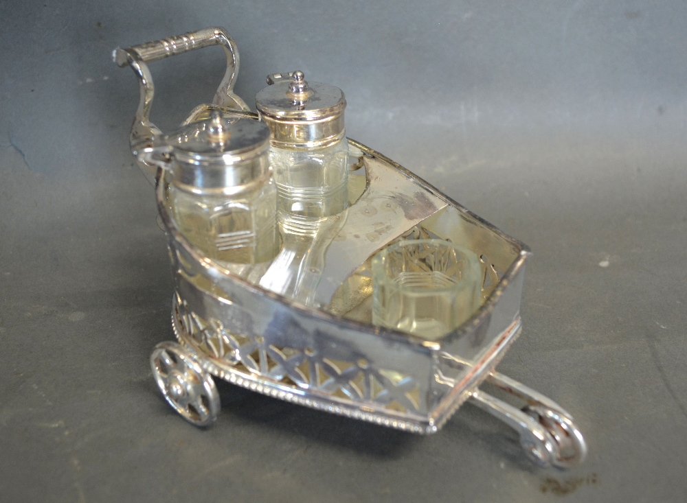 A Silver Plated Condiment Set in the for