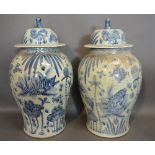 A Pair of Chinese Underglaze Blue Decorated Large Oviform Covered Vases,