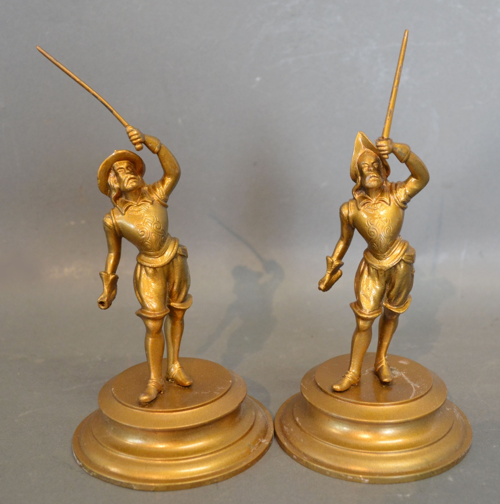 A Pair of Gilded Metal Figures of Cavali