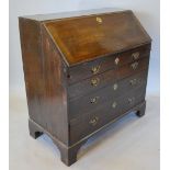 A George III Oak Bureau, the moulded fal