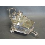 A Silver Plated Condiment Set in the for