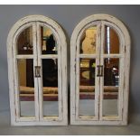 A Pair of Arched Cream Painted Wall Mirr