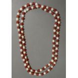 A Cultured Pearl and Garnet Bead Necklac