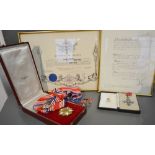 A Cased CBE presented to David Jones with Certificate,