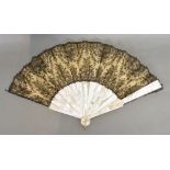 A Mother of Pearl Chantilly Black Lace Fan, with original satin covered box,