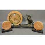 An Art Deco Variegated Marble Three Piece Clock Garniture,