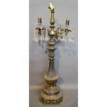 A Gilt Metal Four Branch Candelabrum with variegated marble base,