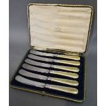 A Set of Six Edwardian Silver Butter Knives by Garrard & Co. Ltd.