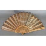 A Brown Satin Leaf Fan,