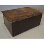 An 18th Century Oak Bible Box, the hinged top above a carved front with iron escutcheon,