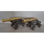 A Pair of Heavy Bronze Cannon with Cast Iron Griffin Carriages,