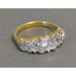 A Gold Five Stone Diamond Band Ring,