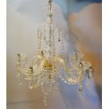 An Edwardian Glass Five Branch Chandelier with facet cut glass drops