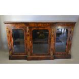 A Victorian Walnut Gilt Metal Mounted and Marquetry Inlaid Break Front Credenza with three glazed