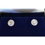 A Pair of 18ct. White Gold Diamond Ear Studs, approximately 0.