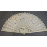 Two Ivory and Silkwork Fans, together with another ebonised fan with gilt decoration and rouge silk,