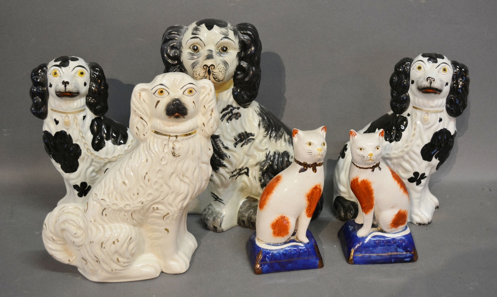 A Pair of Staffordshire Models of Spaniels,