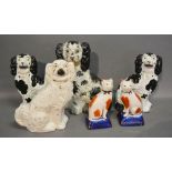 A Pair of Staffordshire Models of Spaniels,