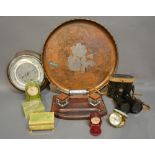 A Beaten Copper and Pewter Circular Tray by Harold Holmes together with a leather desk set,
