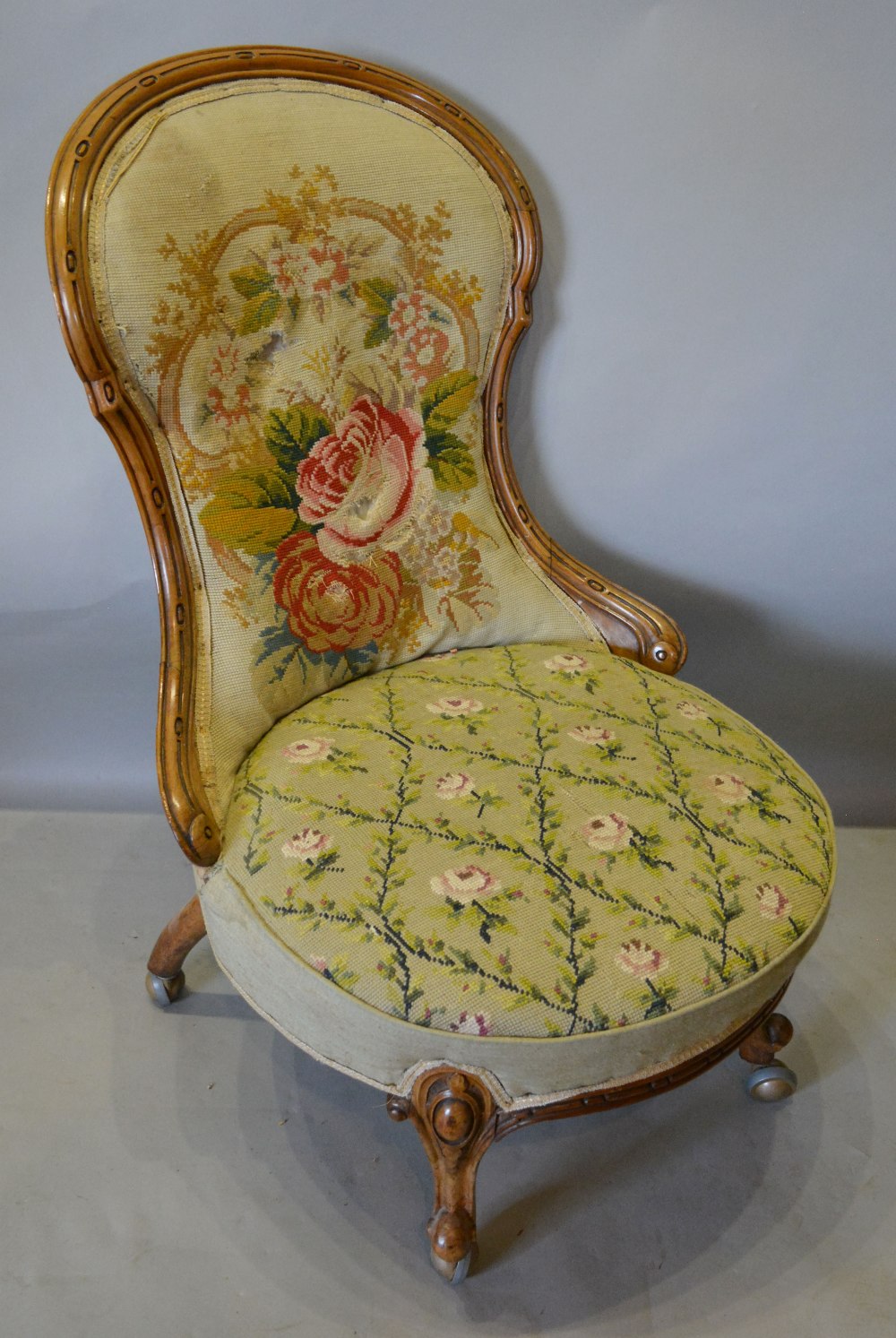 A Victorian Walnut Drawing Room Chair,
