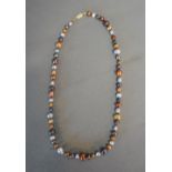 A Multi-Coloured Cultured Pearl Necklace with 9ct.