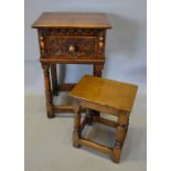 A 20th Century Green Oak Bedside Table, the moulded top above a carved drawer with knob handle,