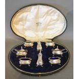 A Birmingham Silver Eight Piece Cruet Set,