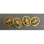 A Pair of Indian Yellow Metal Cufflinks pierced with Figures, 10.
