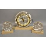 An Art Deco Marble Clock Garniture of Cylindrical Form,