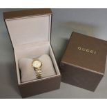 A Gucci Timeless Bi-Metal Ladies Wrist Watch with Original Box and Paperwork