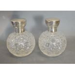 A Pair of Birmingham Silver and Cut Glass Scent Bottles of Globular Form