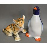 A USSR Model of a Tiger together with another similar USSR Decanter in the form of a Penguin