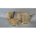 An Art Deco Silver Three Piece Tea Service comprising teapot,
