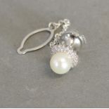 A White Metal Pearl and Diamond Tie Pin
