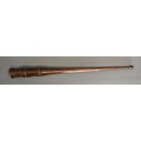 A Turned Wooden Baton of Tapering Form,