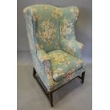 A 19th Century Wingback Armchair with Shaped Back and Arms,