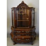 A Dutch Walnut Bombe Cabinet on Chest,