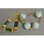 A Chinese Jade and Yellow Metal Set Bracelet together with another similar yellow metal bracelet